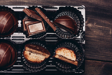chocolate sweets and cakes covered with icing