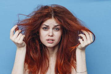 red-haired woman with disheveled hair