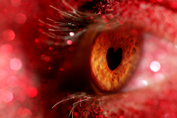 Eye closeup with iris in the shape of a heart