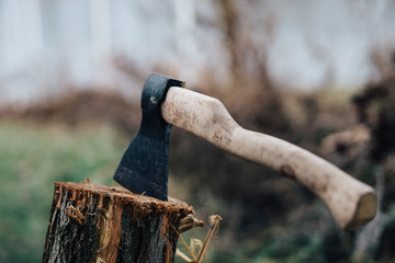 chop wood with an ax