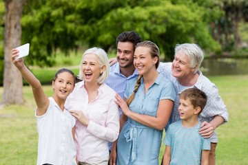 Multi-generation family taking a selfie on a mobile phone