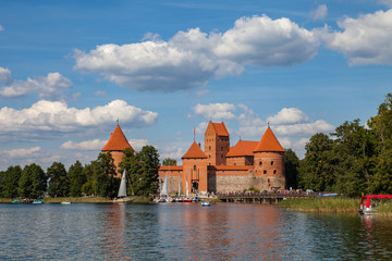 TRAKAI, LITHUANIA - 22 AUG 2015: Unidentified people enjoy boat trip at Galve lake at summer day,...