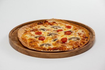 Delicious italian pizza served on pizza tray