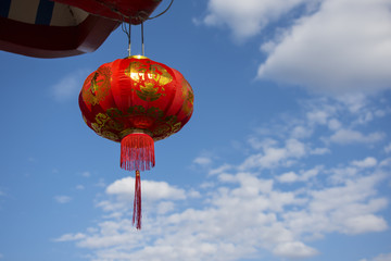 Chinese lanterns with blue sky background.