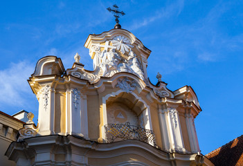 Fototapeta na wymiar Top of Basilian monastery gate in the Old Town in Vilnius in Lithuania, architerture's details