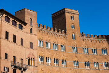 Palaces in Piazza del Campo (Campo square) in the downtown of Siena, Tuscany, Italy