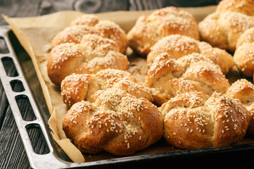 Homemade bread rolls with sesame seeds.
