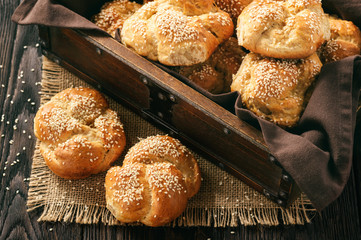Homemade bread rolls with sesame seeds.