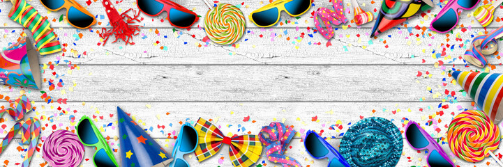 colorful party carnival birthday confetti wide panorama background pattern with streamer sunglasses hat lolly pop wood / Kindergeburtstag Fastnacht Fasching Hintergrund mit Konfetti isoliert