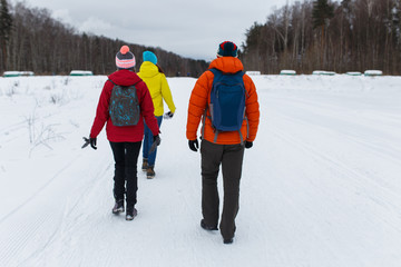 Young friends in winter woods