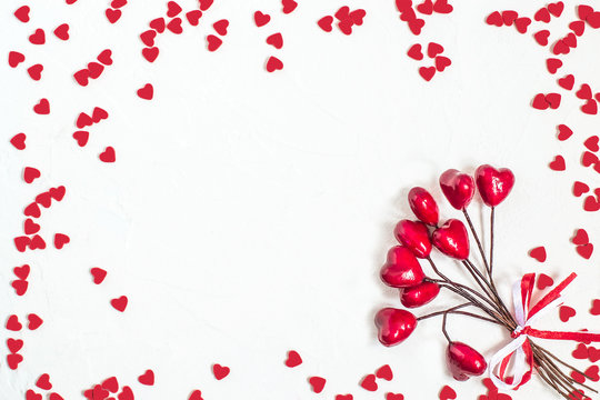 Festive background with decorations in the shape of heart