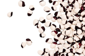 Black and white haricot beans close-up with copy space, isolated on white background, top view, beans background.