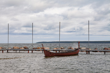 Obraz premium Old style wooden fishing boat in the Baltic Sea