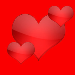 Three red hearts isolated on  background