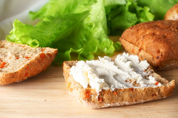 bun with cheese and lettuce