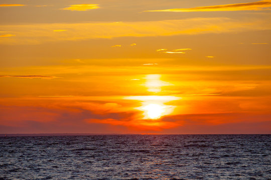Orange sunset at summer over Baltic sea
