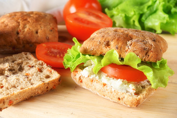 veggie burger with tomatoes, cheese and lettuce