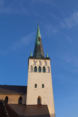 Fototapeta na wymiar Beautiful St. Olaf church in the Old Town of Tallinn, Estonia