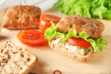 veggie burger with tomatoes, cheese and lettuce