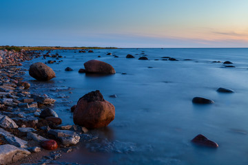 Sunrise on Baltic sea. Rocky coast of Estonian island