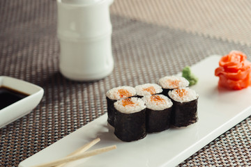 Traditional fresh Japanese sushi rolls on a white plate © maxfotoadobe