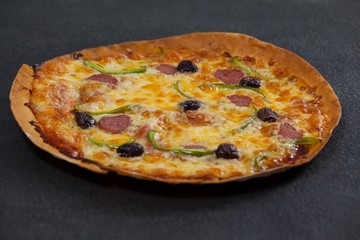 Delicious italian pizza served on pizza tray