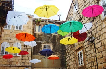Fototapeta na wymiar Street decorated with colorfull umbrellas