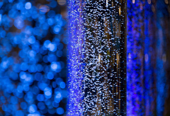 Interesting atmosphere with blue bubbles floating bokeh mood
