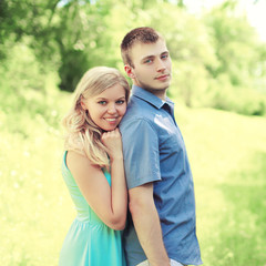 Obraz premium Portrait happy loving young couple together outdoors