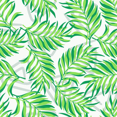 Obraz na płótnie Canvas Tropical background with palm leaves. Seamless floral pattern