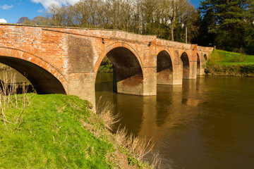 Bredwardine Bridge, red brick crossing river Wye