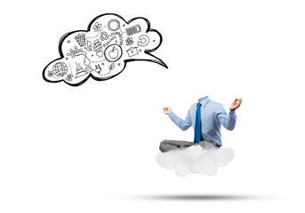 Headless businessman meditating