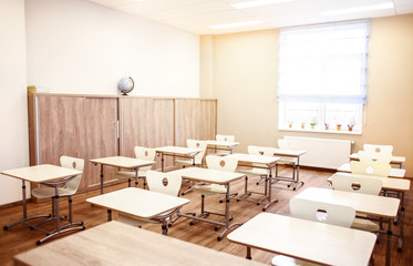 Empty classroom with chairs and desks