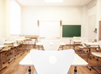 Empty classroom with chairs and desks