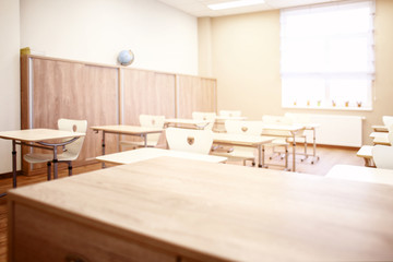 Empty classroom with chairs and desks