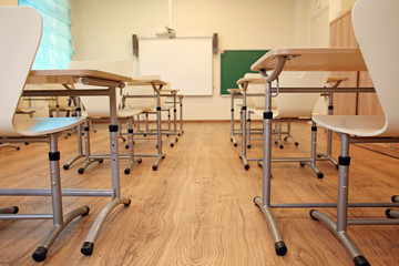 Empty classroom with chairs and desks