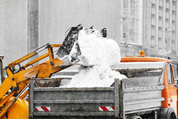 Snow plow outdoors cleaning street