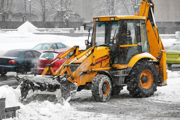 Snow plow outdoors cleaning street