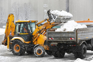 Snow plow outdoors cleaning street