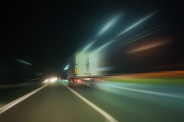 Obraz na płótnie Canvas truck moves on highway at night