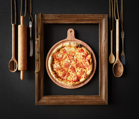 Hot pizza slice with melting cheese with frame concept close up photo