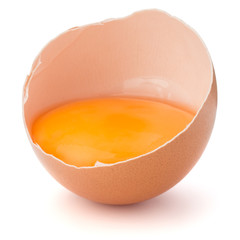 Broken egg  in eggshell half isolated on white background cutout