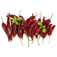 Dried red chili or chilli cayenne pepper isolated on white  back