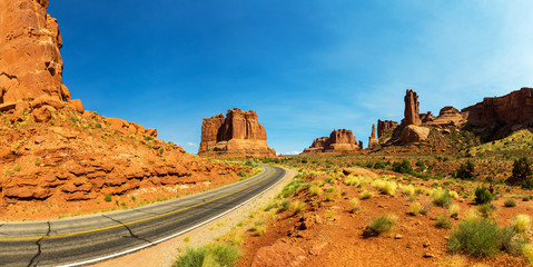 Road and rocky mountains in the distance landscape