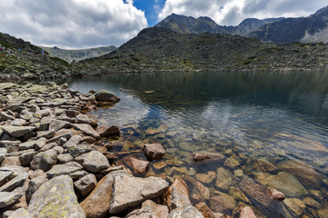 Reflection of Irechek peak in Musalenski lakes,  Rila mountain, Bulgaria