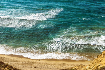 beach with hill on the background of the sea
