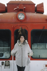 Brown attractive girl raised in the coach of train