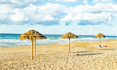 Decorative umbrellas made of palm branches