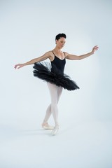 Fototapeta premium Ballerina practicing ballet dance