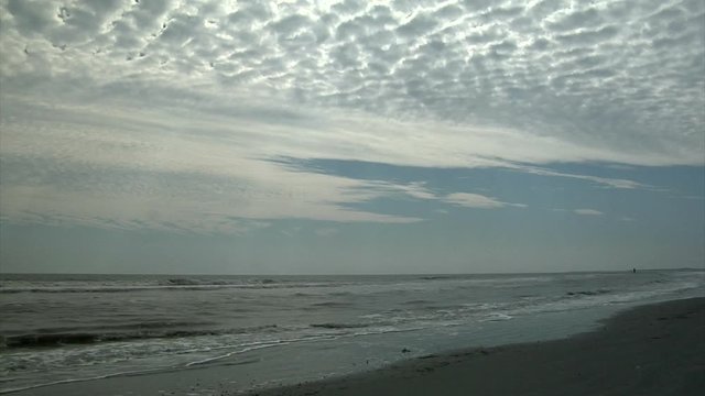 Clouds Pass Over Deserted Seashore
